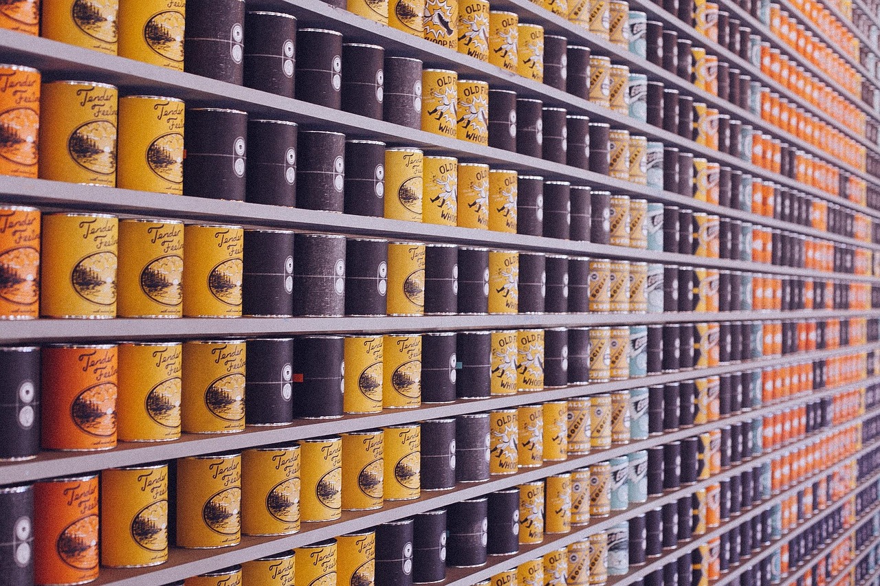 Cases of packaged food and beverages stocked in a distribution warehouse
